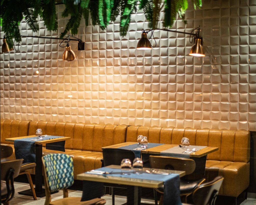 Smooth patterned textured walls with superb lighting in your restaurant.