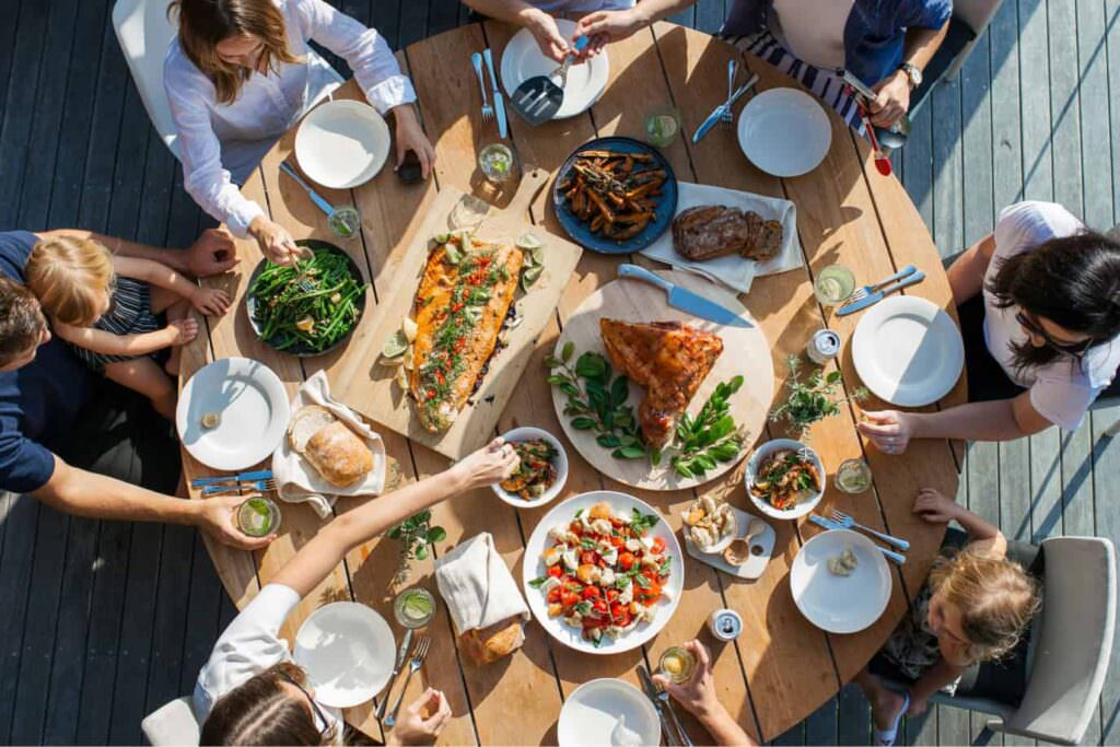 A table full of food at a beautiful restaurant. A great image to accompany our blog article on restaurant web design.